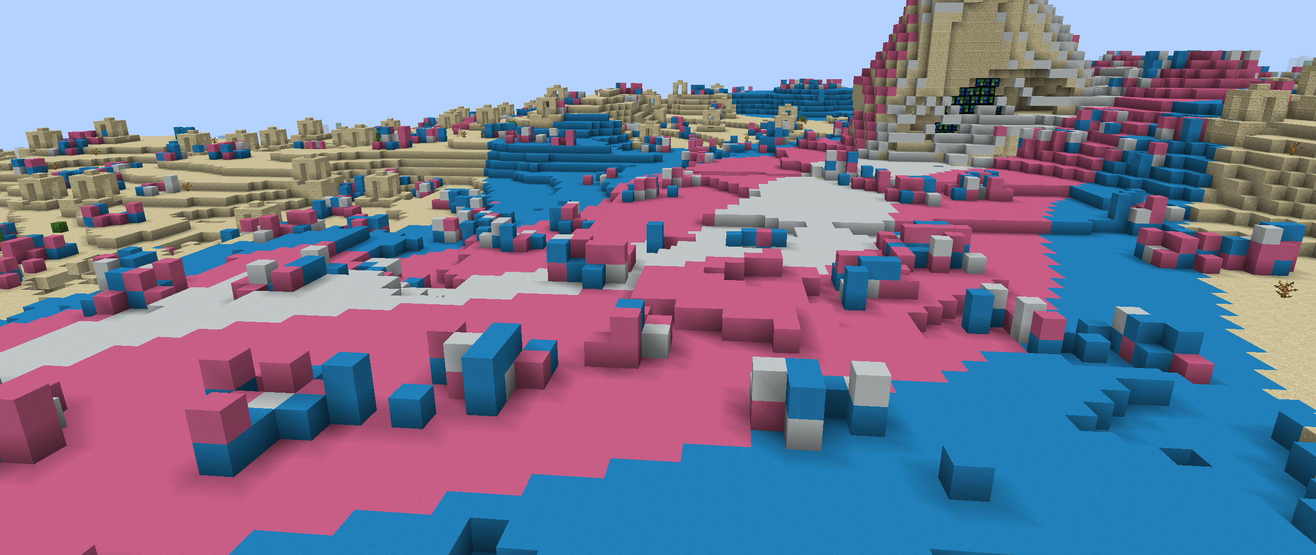 An image of the Minecraft’s ground transformed into a gorgeous transgender flag.